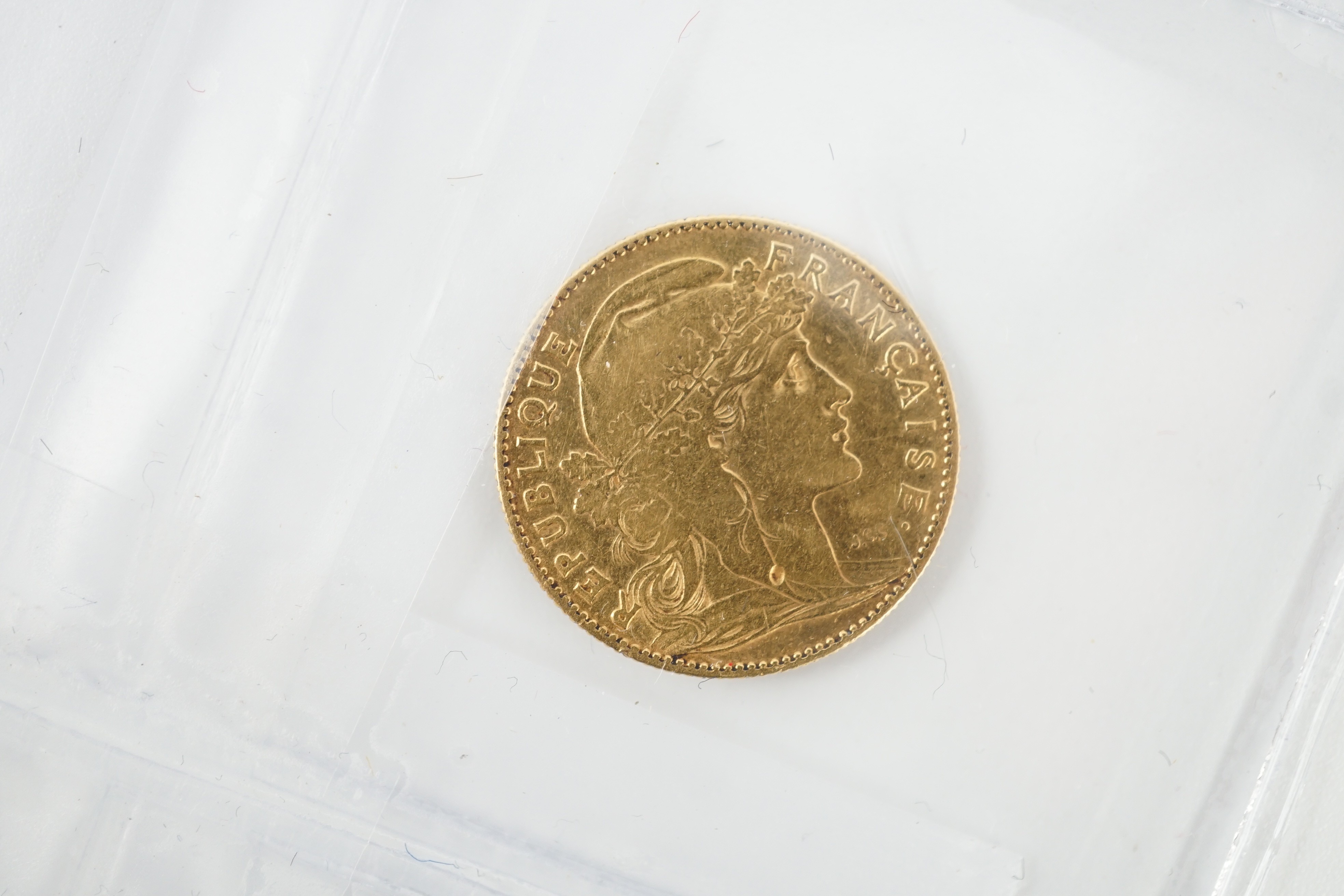 Two gold sovereigns, Victoria 1898M and Edward VII 1910, a George V half sovereign 1913 and a France gold 10 francs 1900 (test mark to portrait).